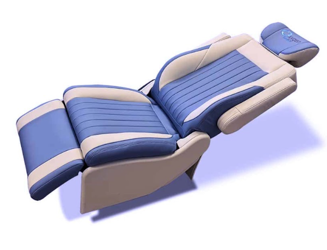 Fully reclined two-tone light blue and cream leather lounger chair with Oxygen branded headrest, vertical channel stitching, and padded bolsters