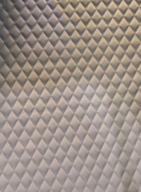 Light gray quilted diamond-pattern leather interior lining option for the XLS34D-Mini hyperbaric chamber